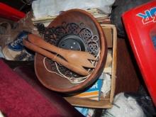 Wooden salad bowl with utensils and clock