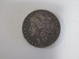 Ungraded 1886-0 Morgan Silver Dollar 1$