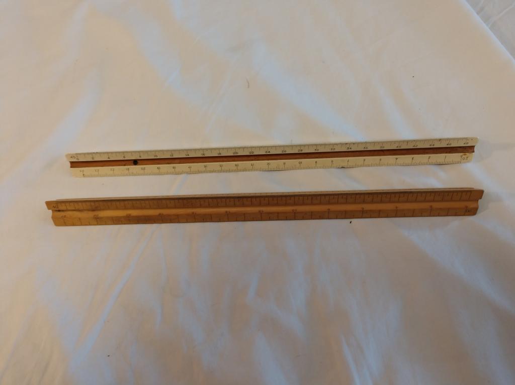 2 vintage drafting rulers and 2 instant spellers