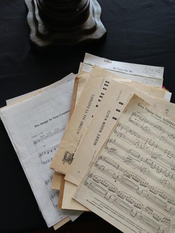 Lot of old sheet music and lyrics