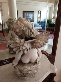 Cherub with a lantern table top statue