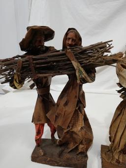 3 vintage paper mache figures bringing wood