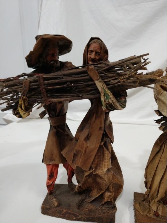 3 vintage paper mache figures bringing wood