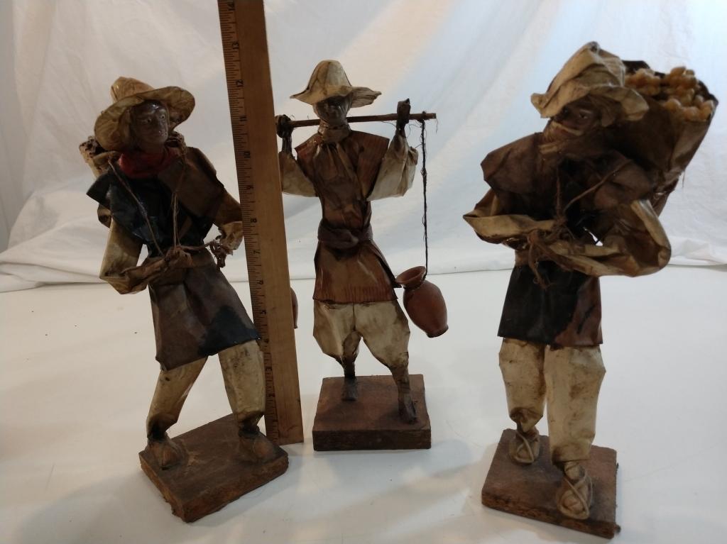 3 vintage paper mache figures bringing water/food