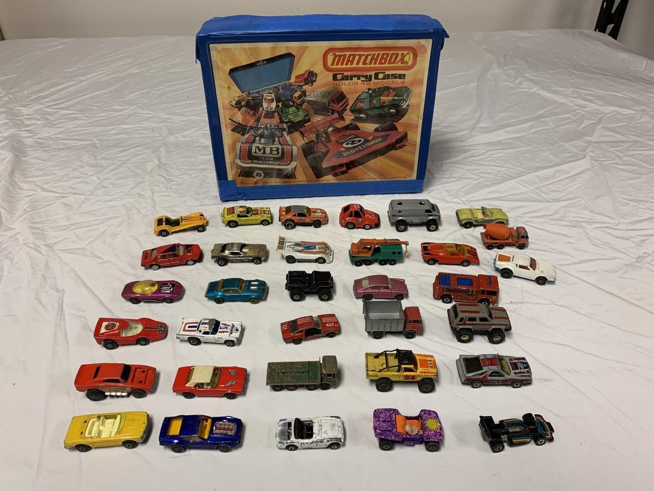 33 Vintage Hot Wheel Diecast vehicles w/ Case