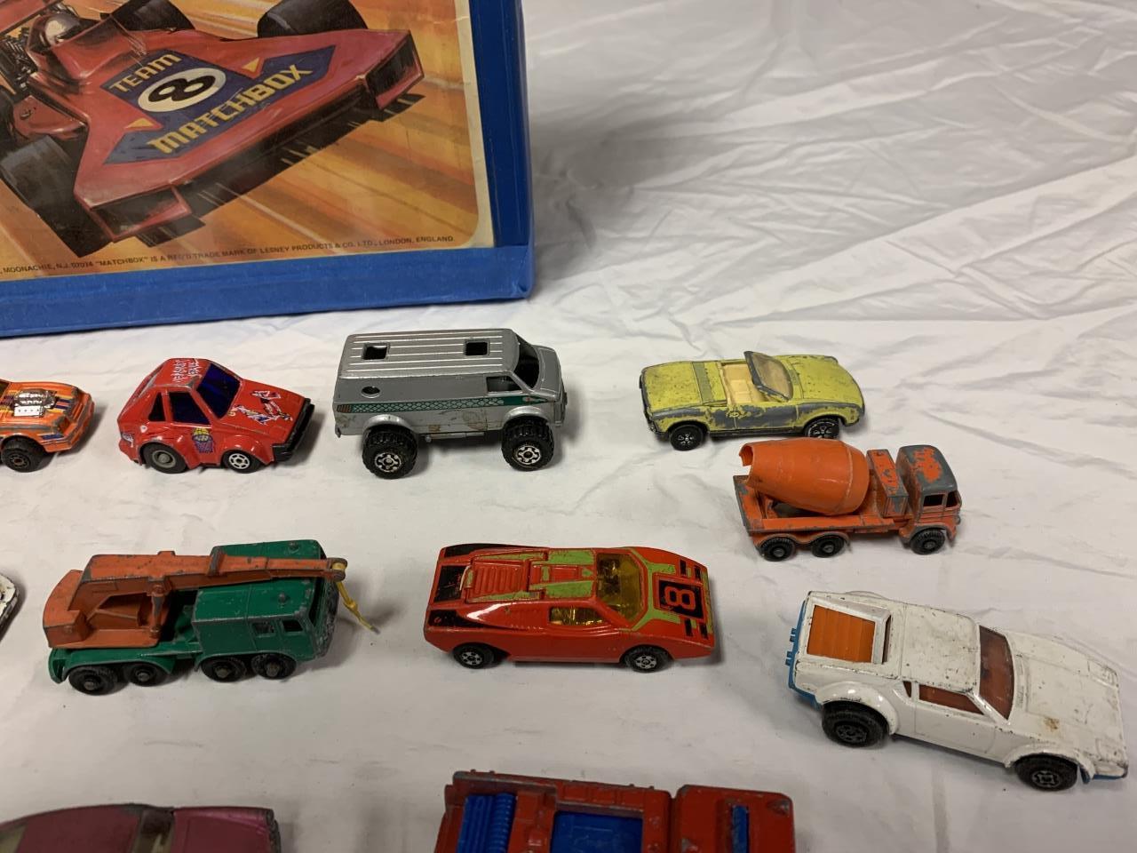 33 Vintage Hot Wheel Diecast vehicles w/ Case