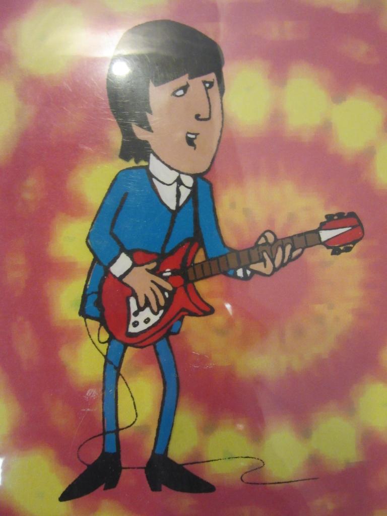 Cartoon Art of A Beatle With a Tie-Dye Print Back