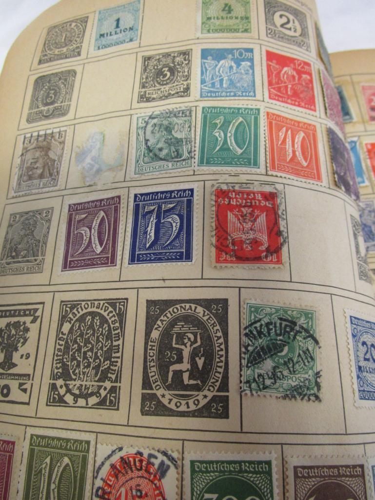 Vintage Around-The-World stamp book with over 500 vintage stamps