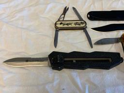 Lot of 4 Folding Pocket Knifes and 1 Fixed Blade Knife