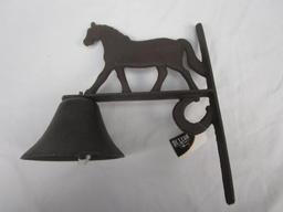 Cast iron wall mount bell with horse figure