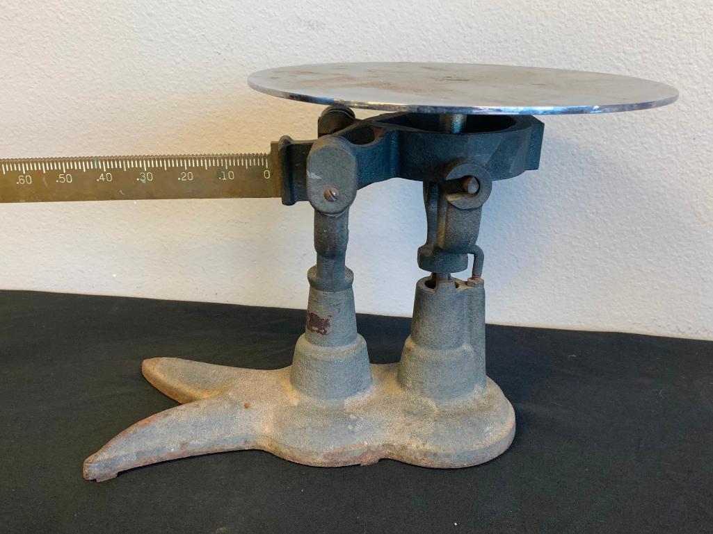 vintage cast iron table top scale with weights