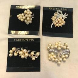Lot of 9 Gold-Toned and Faux Pearl Brooches