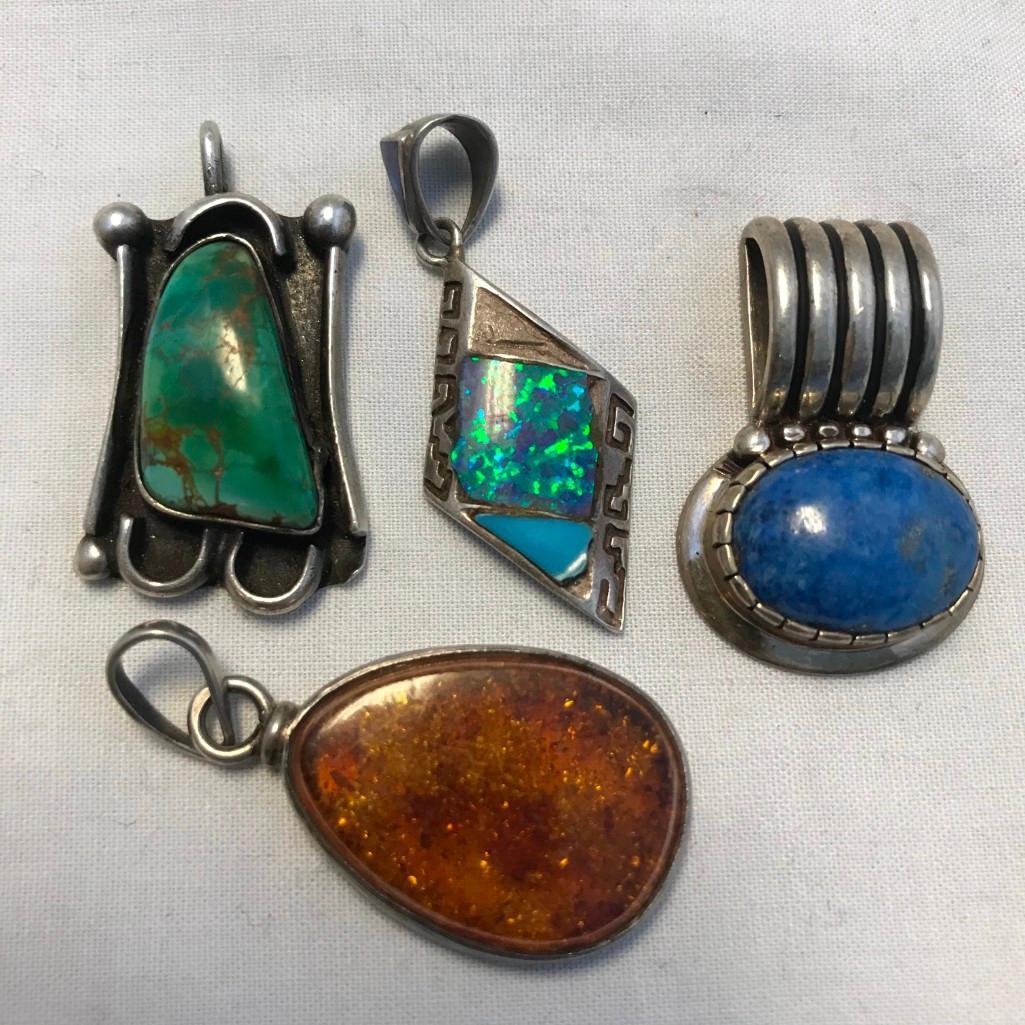 Lot of 7 Misc. Sterling Silver Charm/Pendants with Various Center Stones