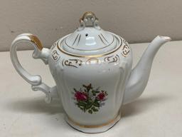 Vintage porcelain Musical Tea Pot with lid