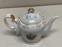 Vintage porcelain Musical Tea Pot with lid