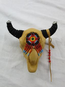 Leather-wrapped and beaded miniature bull-head with horns Native American-style decorative item