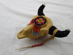 Leather-wrapped and beaded miniature bull-head with horns Native American-style decorative item