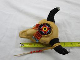 Leather-wrapped and beaded miniature bull-head with horns Native American-style decorative item