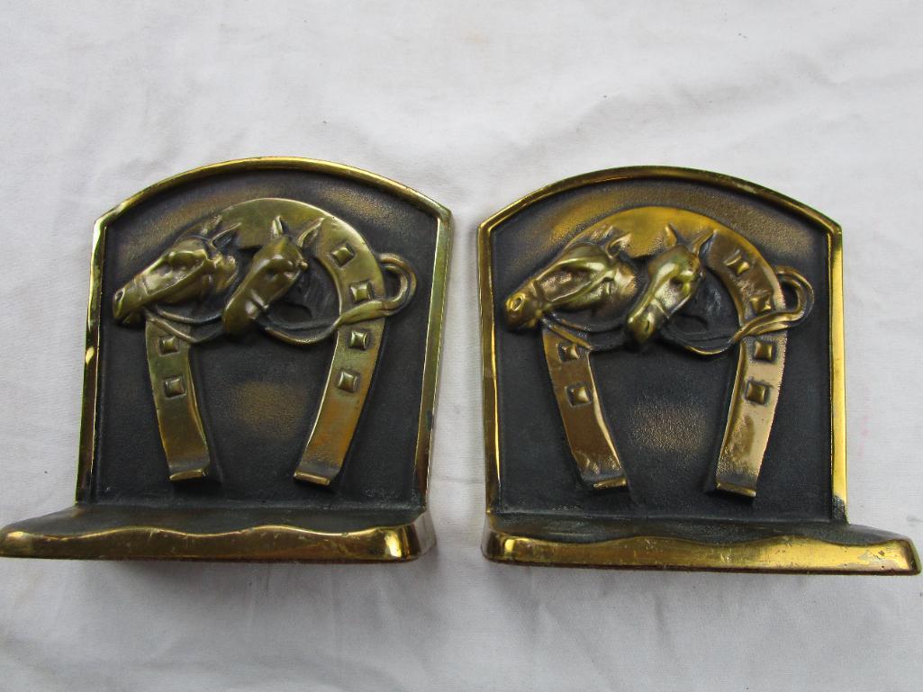 Pair of vintage brass and copper horse and horse shoe book ends