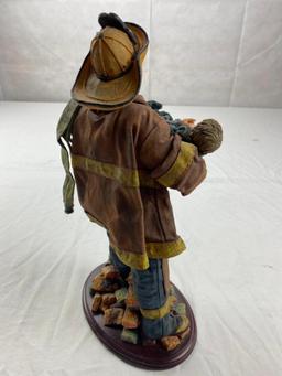 Cloth Fireman figure carrying small child