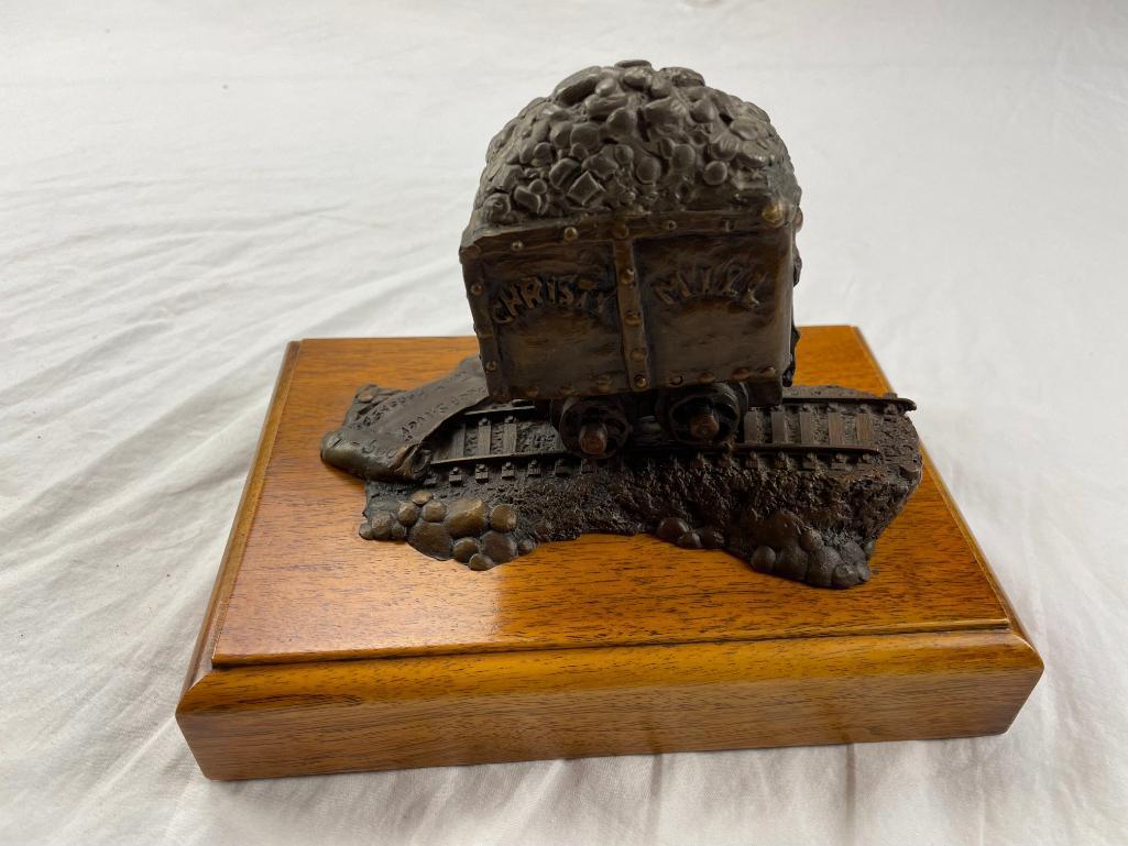 Bronze silver reef mining car statue on wood base by Jerry Anderson 1986. 7.5" x 5"