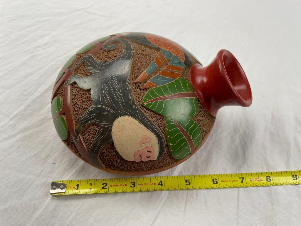 African pottery water vessel with image of monkey and bird 7.5"