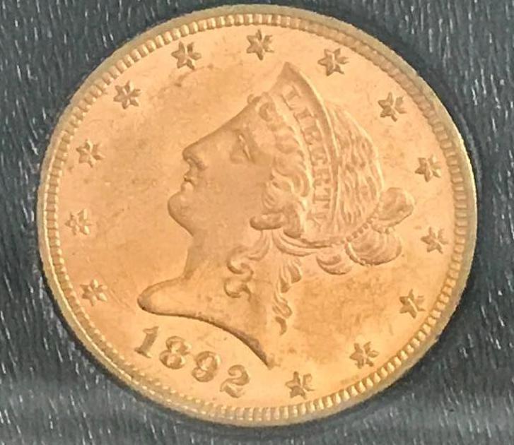 The 1892 Swiss Bank Hoard Gold Eagle 10 Dollar Coin in Leather Flip Binder