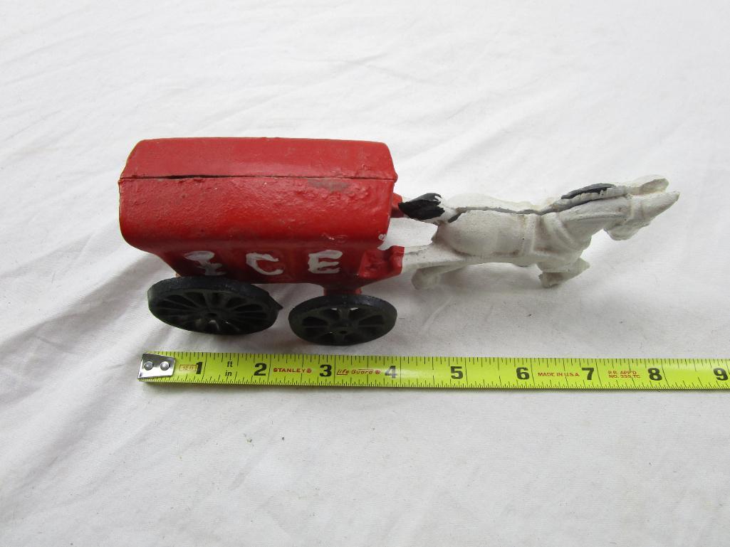 Cast iron horse drawn ice cart reproduction figurine. 7" long.