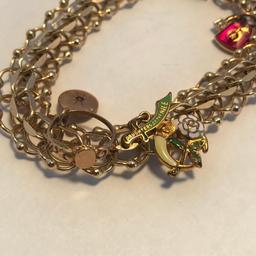 14K Gold Charm Bracelet (Marked 14K on Clasp). 26.11 grams