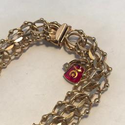 14K Gold Charm Bracelet (Marked 14K on Clasp). 26.11 grams