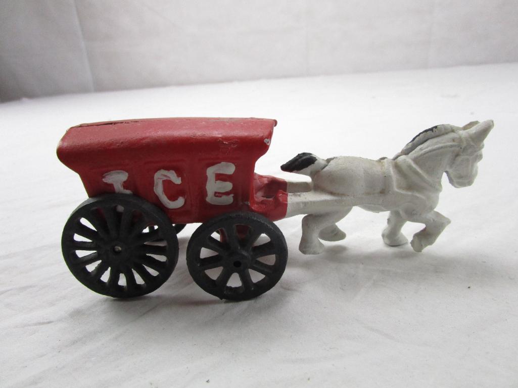 Cast iron horse drawn ice cart reproduction figurine. 7" long.