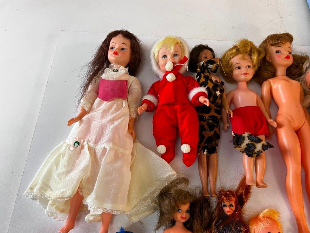 Large lot of Vintage Dolls from the 1960's with clothing, Barbies , Other Brands and also a Storage