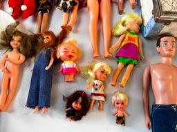 Large lot of Vintage Dolls from the 1960's with clothing, Barbies , Other Brands and also a Storage