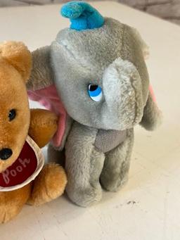 Vintage Walt Disney Winnie The Pooh and Dumbo Plush plus a Disneyland Cup with lid