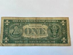 One Dollar Silver Note 1957A.... Discoloration and bent corners