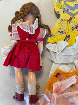 Vintage doll with large lot of clothing