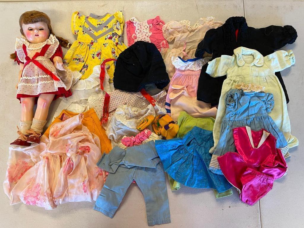 Vintage doll with large lot of clothing