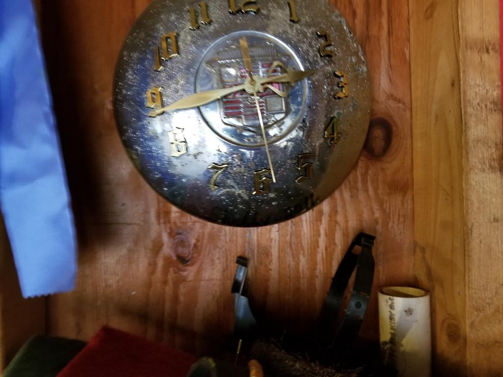 Contents of Top Shelf, Oil Cans, Hubcap Clock