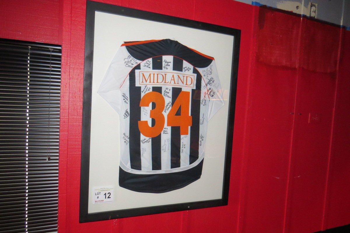 Framed Midland Signed Girls Soccer Jersey.