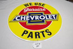 We Use Genuine Chevrolet Parts Round Single Sided Reproduction Sign, 23 1/2" Diameter.
