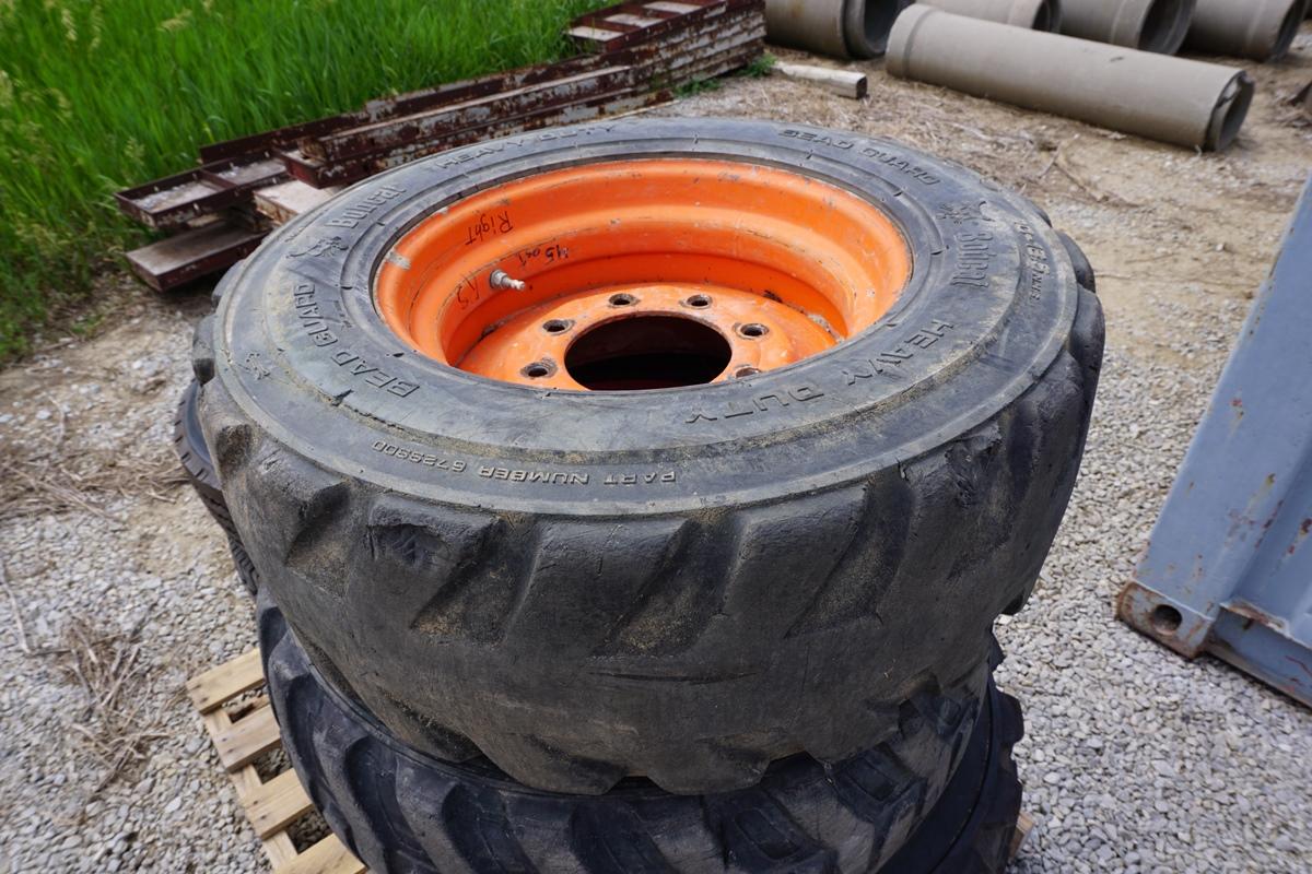 (4) 10-16.5 Bobcat Skidsteer Tires w/ Wheels.