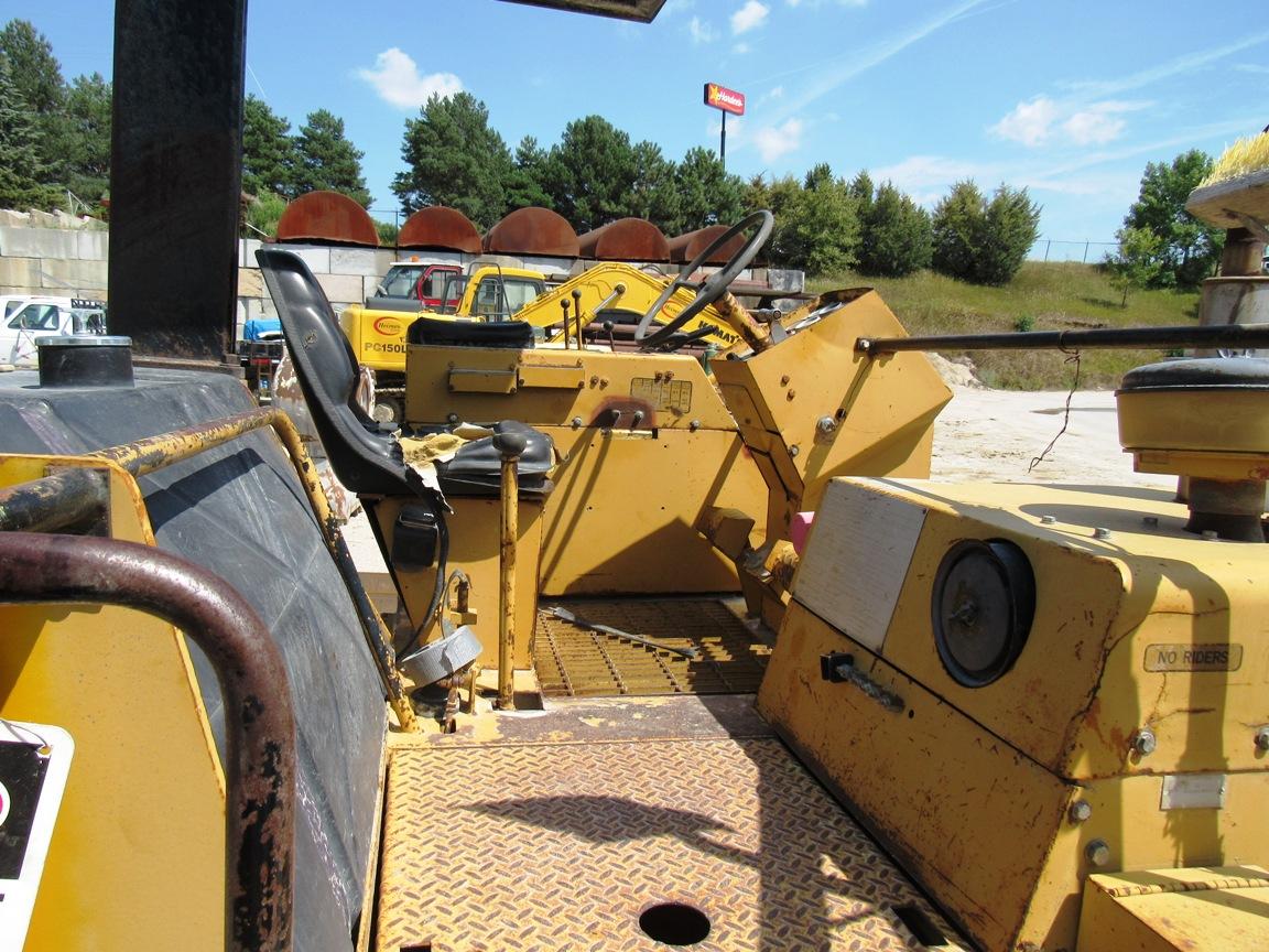 Caterpillar Model 100 Concrete Grinder, ROPS Roll Bar, SN# W010930538, 5,553 Hours.