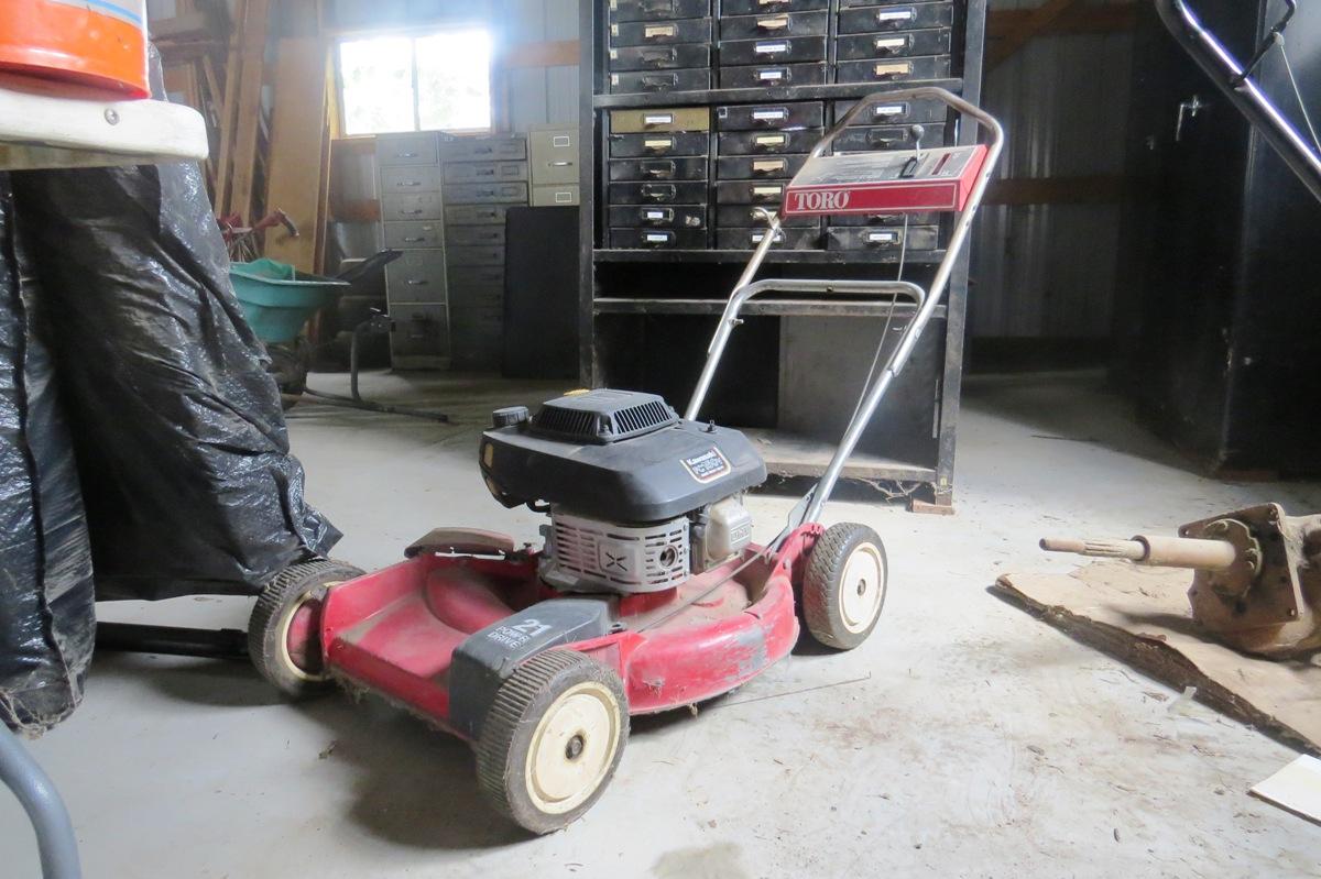 Toro Walk-Behind Lawn Mower.