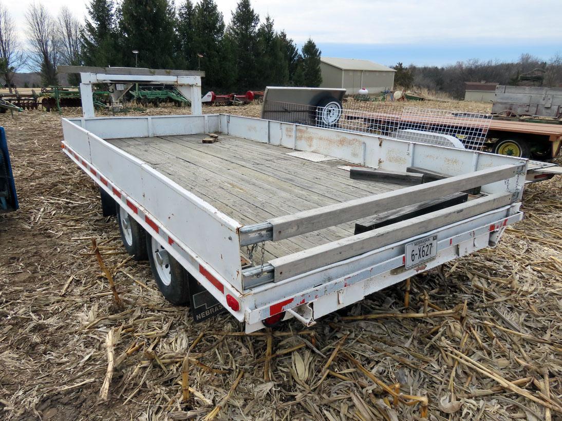 Gooseneck Flatbed Tandem Axle Trailer.