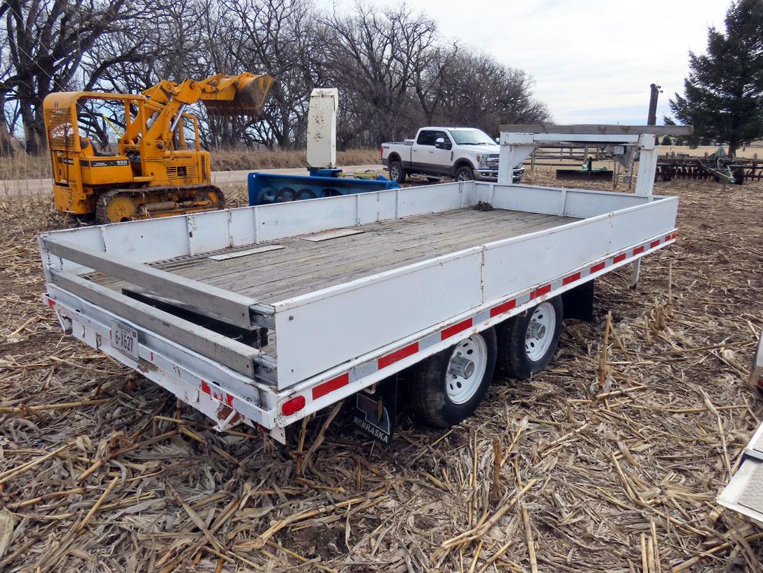 Gooseneck Flatbed Tandem Axle Trailer.