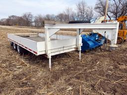 Gooseneck Flatbed Tandem Axle Trailer.