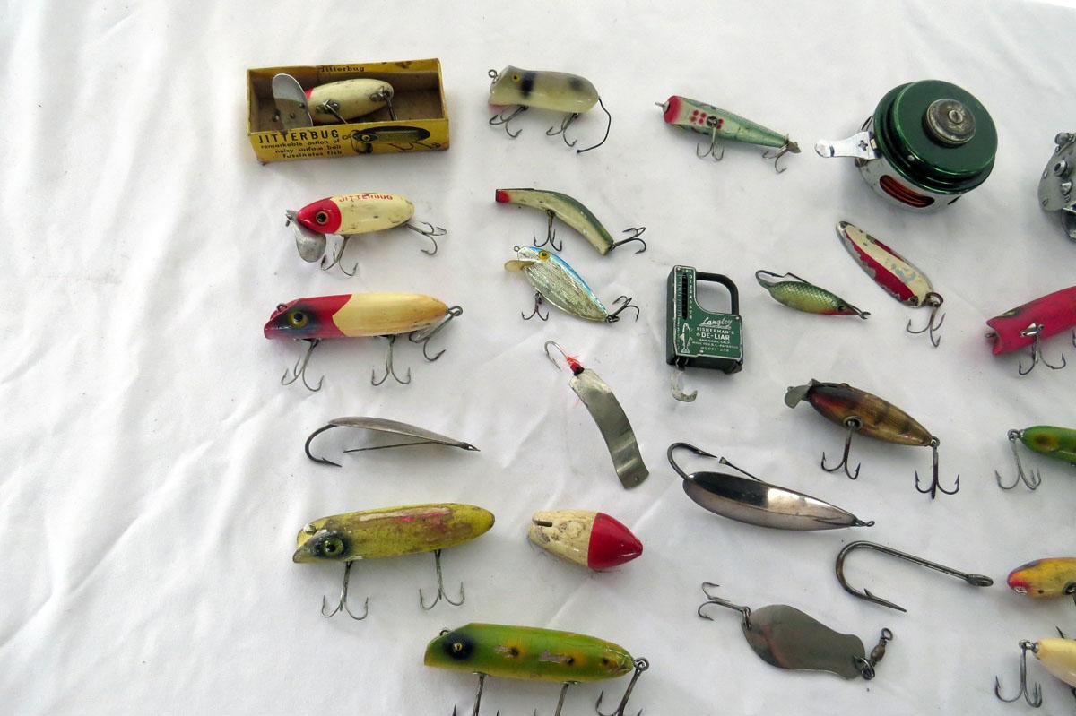 Miscellaneous Lot of (25) Fishing Lures & (3) Reels, (1) Langley Fisherman'