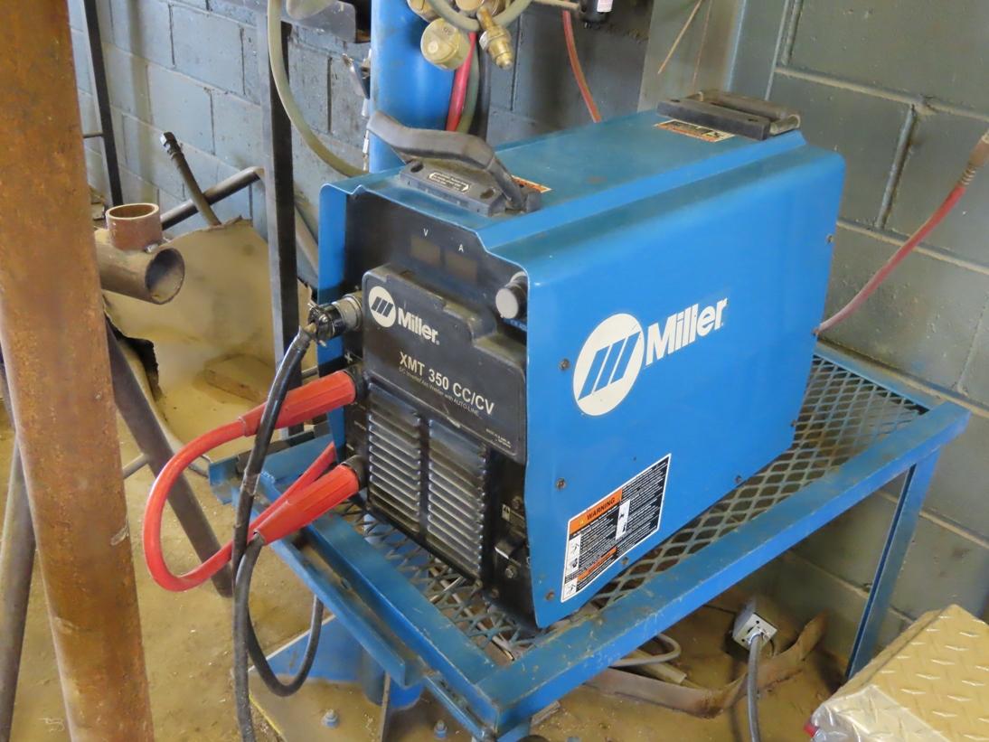 Miller Model XMT 350 CC/CV DC Invertor with Auto-Line Arc Welder with Leans on Stand, Hydraulic Lift
