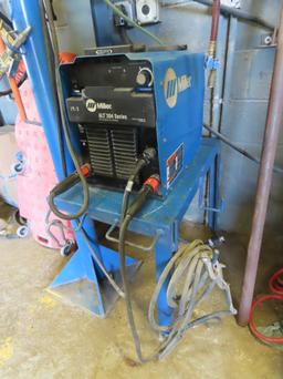 Miller Model ALT 304 Series DC Invertor Arc Welder on Stand with Air/Hydraulic Lift Arm with Miller 
