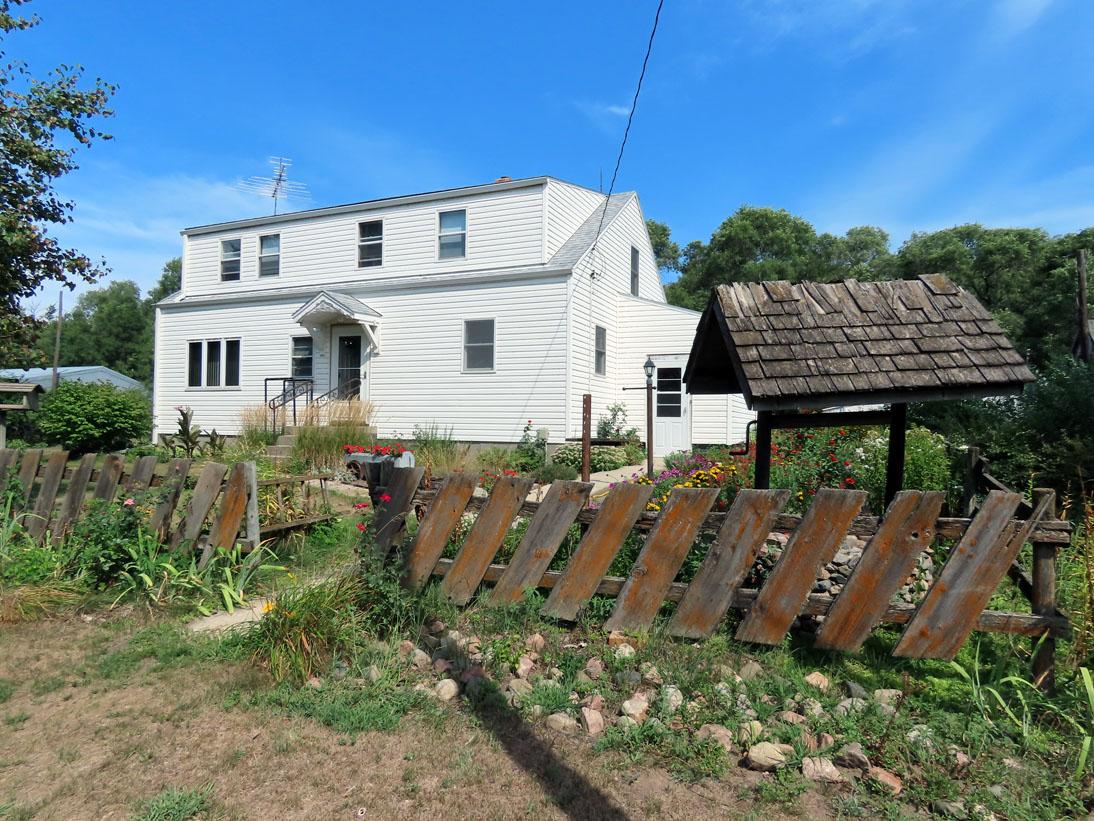 Tract #1 - This Lovely Home and Building Site features an older Farm Home that has been very tastefu